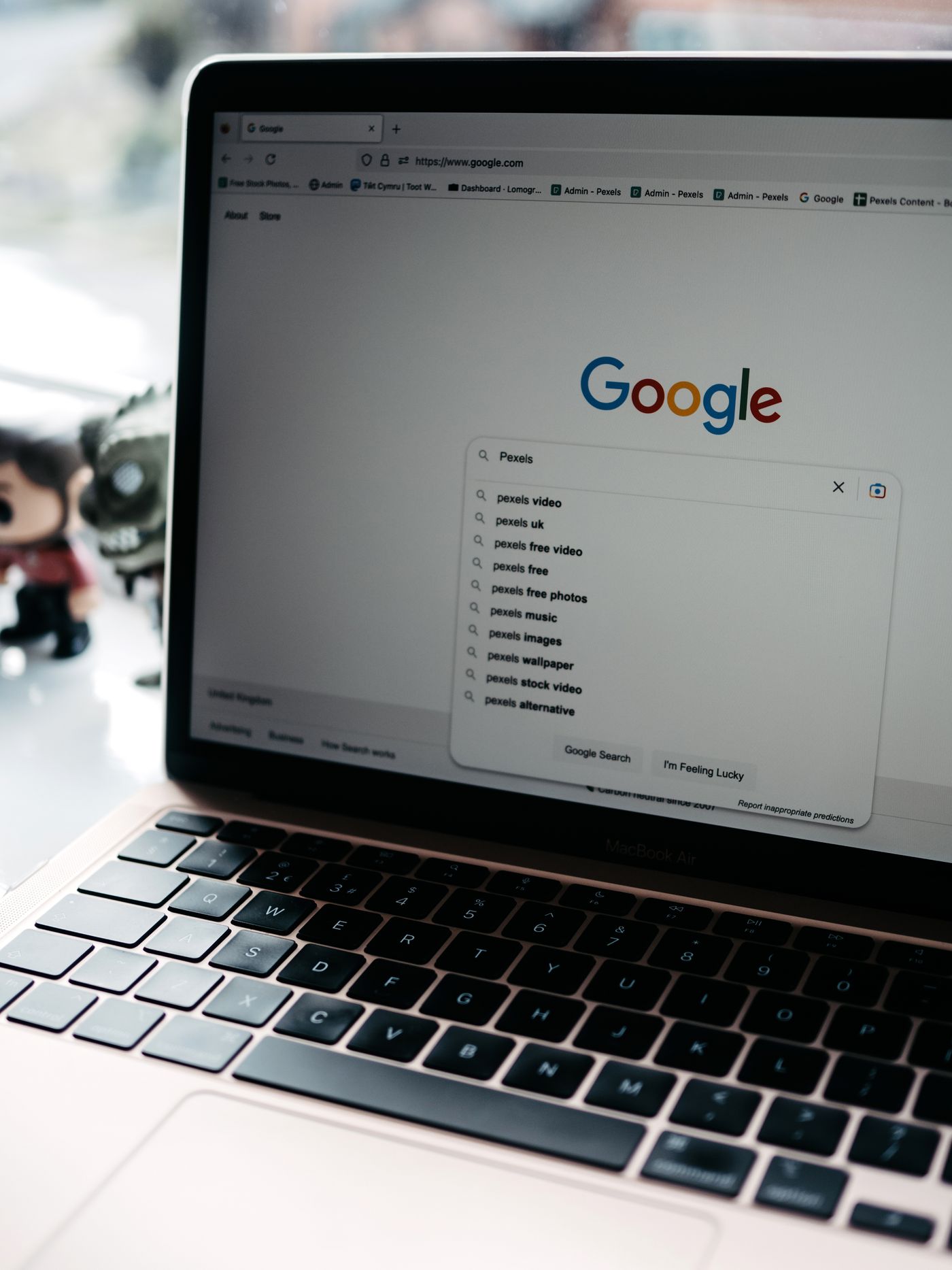 Laptop open on the Google homepage